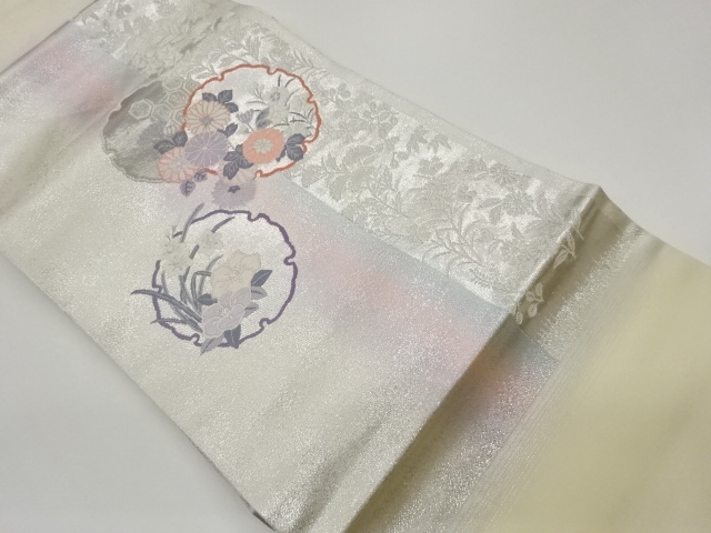 プラチナ二重箔雪輪に花々・花菱亀甲模様織出し名古屋帯